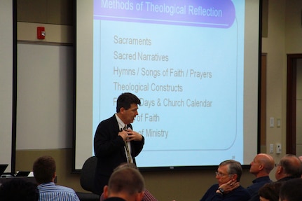 Rev. John Oliver addresses 100 pastors during regional chaplain training June 6, 2013, at Camp Ripley, Minn. Oliver is chief of the chaplain service at the Association for Clinical Pastoral Education at the Durham (N.C.) VA Medical Center.