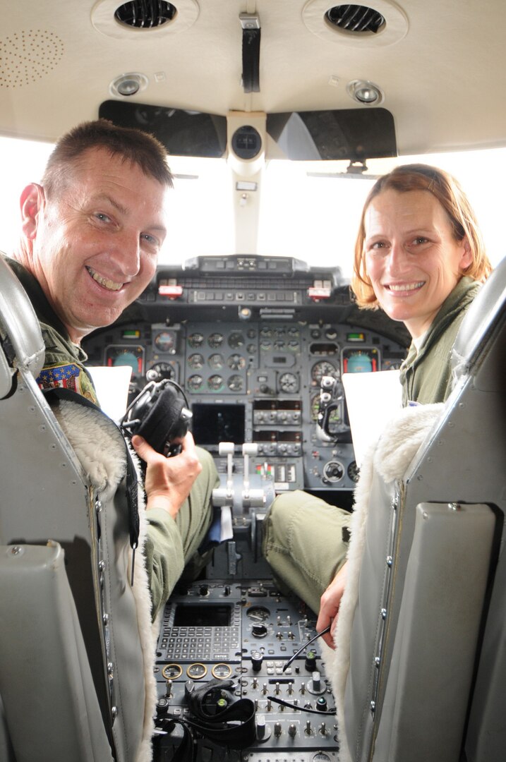 Air Force Col. Ronald Wilson, 110th Airlift Wing commander, and Capt. Jennifer Prichard pilot a C-21 during a fini-flight at the Battle Creek Air National Guard Base, Battle Creek, Mich., June 15, 2013.