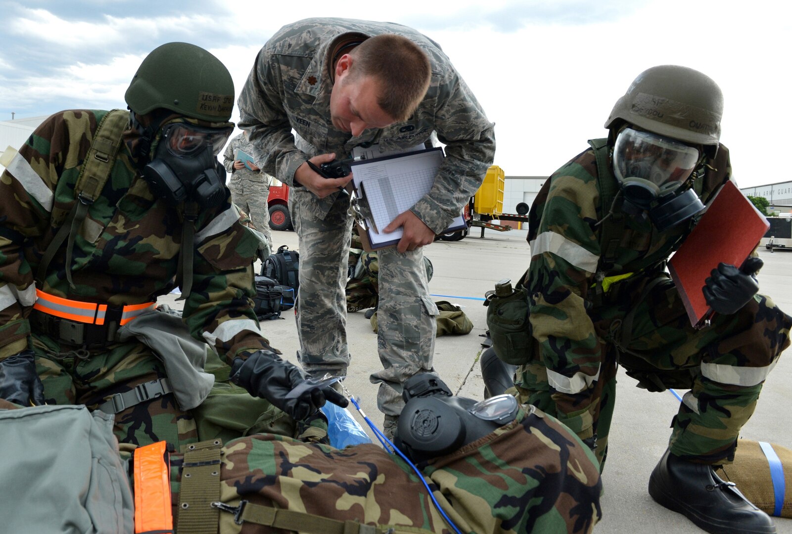 Members of the Nebraska Air National Guard's 155th Air Refueling Wing participate in an Ability to Survive and Operate exercise at the Nebraska National Guard air base in Lincoln, Neb., June 11, 2013.