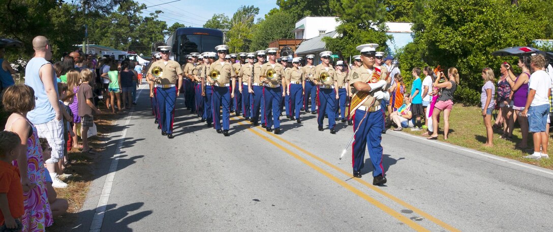 The 2nd Marine Division Band marches in the 42nd annual Shrimp Festival parade in Sneads Ferry, N.C., Aug 10. The festival draws more than 10,000 people annually including many service members and families from the local community. It began in 1971 in honor of the local fishing community which annually brings in more than 385 tons of shrimp. 
Find us on Google + (http://gplus.to/camp.lejeune)
Follow us on Twitter (http://twitter.com/camp_lejeune)
Like us on Facebook (http://www.facebook.com/camp.lejeune)
