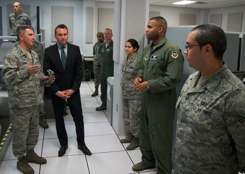 Col. Thomas Lennon, 608th Air Operations Center commander, gives Acting Secretary of the Air Force Eric Fanning a tour of the 608th AOC on Barksdale Air Force Base, La., Aug. 14, 2013. Fanning met with several Barksdale Airmen to learn about their mission and answer any questions they had. (U.S. Air Force photo/Senior Airman Micaiah Anthony)