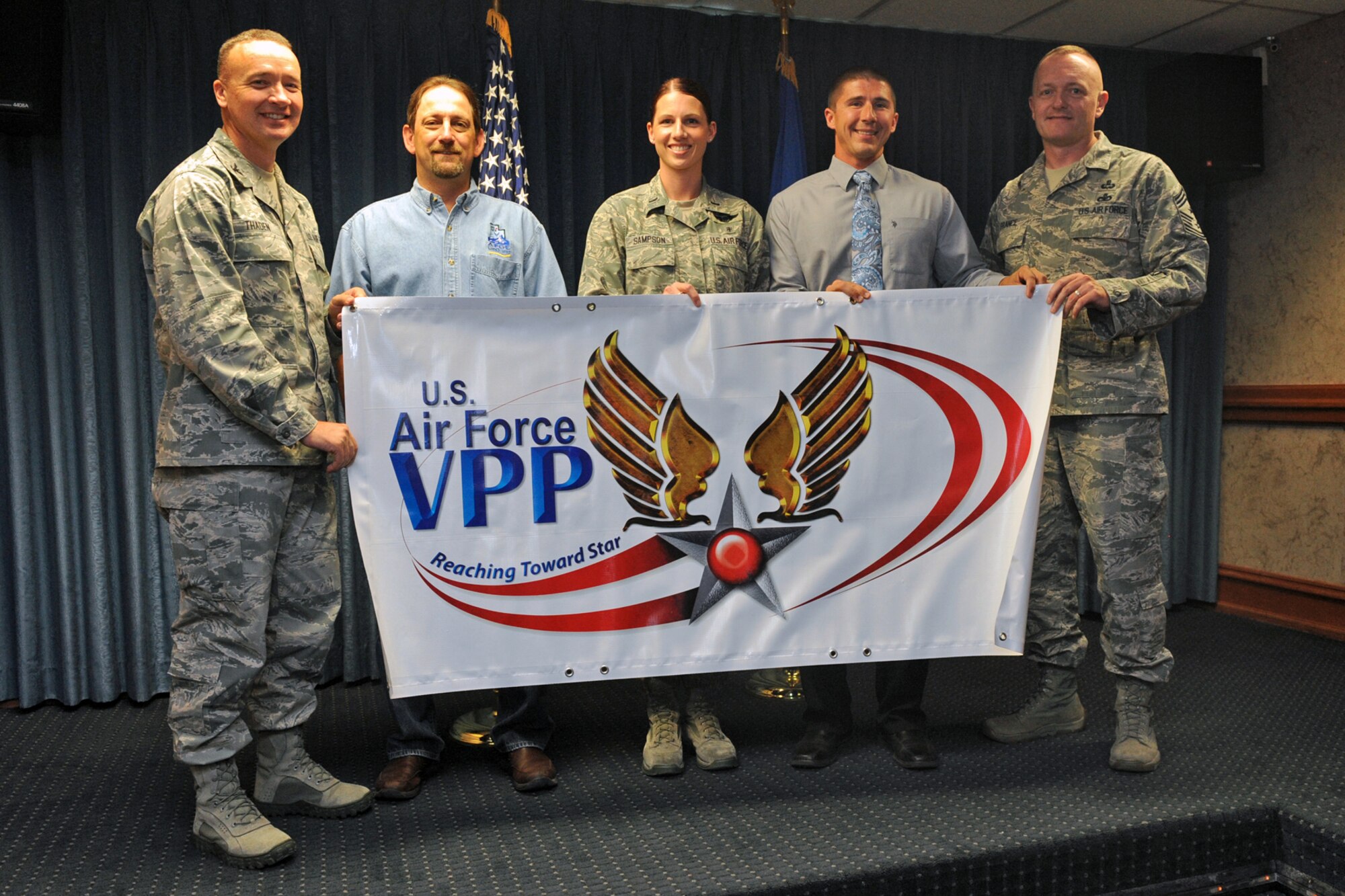 From left: Col. Fred Thaden, 75th ABW vice commander; Monty
Lewis, Union vice president; 1st Lt. Kelly Sampson, 75th ABW Medical Group,
Adam Sandbek, 75th ABW Small Computers, and Chief Master Sgt. Jason France,
75 ABW command chief. (U.S. Air Force photo by Alex R. Lloyd/Released)