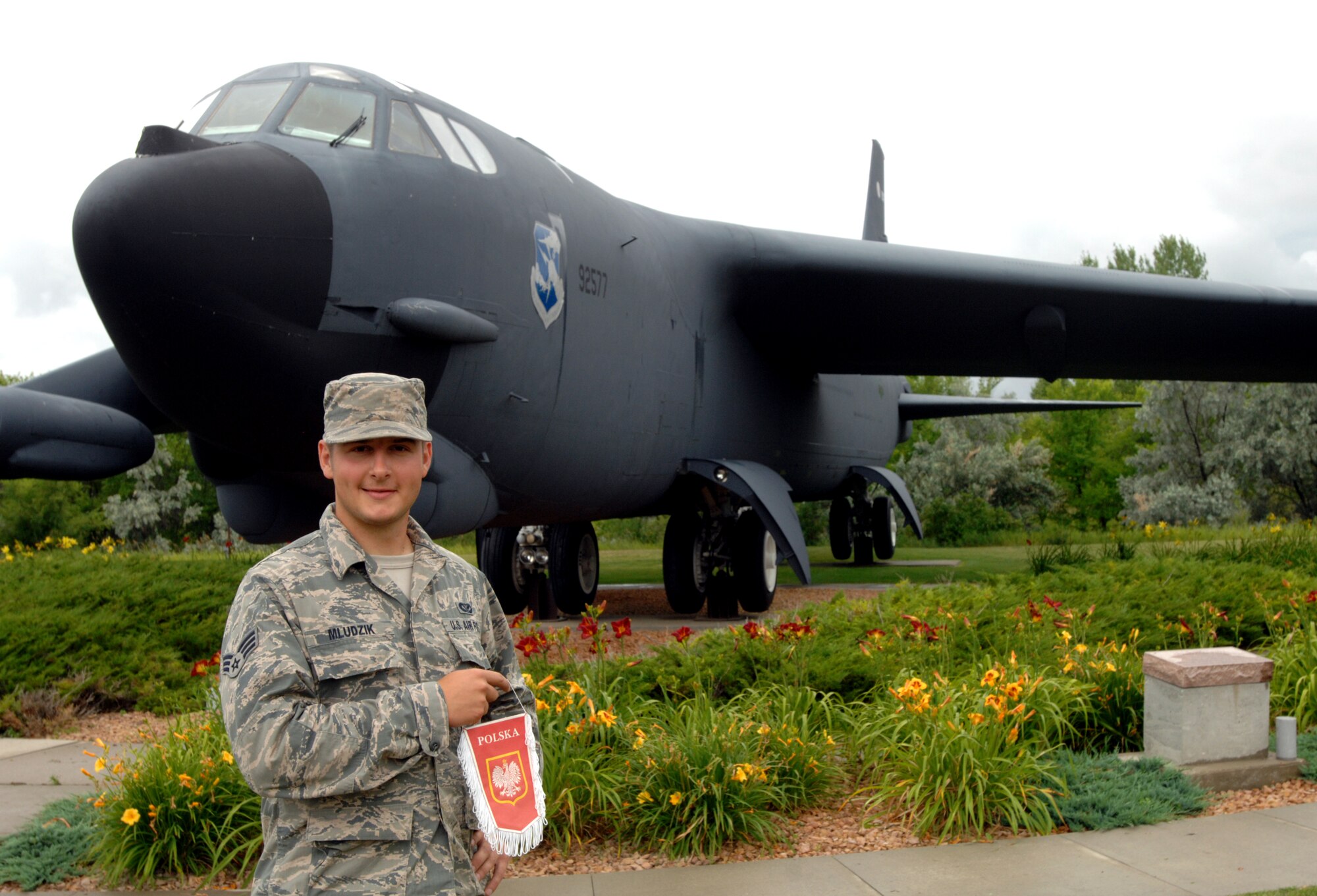 Senior Airman Dawid Mludzik, 319th Civil Engineer Squadron structures journeyman, is on a pathway to officially becoming a U.S. citizen. He and his family are first-generation immigrants from Poland who came to the U.S. when Mludzik was only 7. With his American citizenship within his reach, Mludzik can now set his sights on studying aeronautical science at the University of North Dakota, earning his degree in commercial aviation, and commissioning back into the Air Force, hopefully as a C-17 pilot. (U.S. Air Force photo/Staff Sgt. Susan L. Davis)