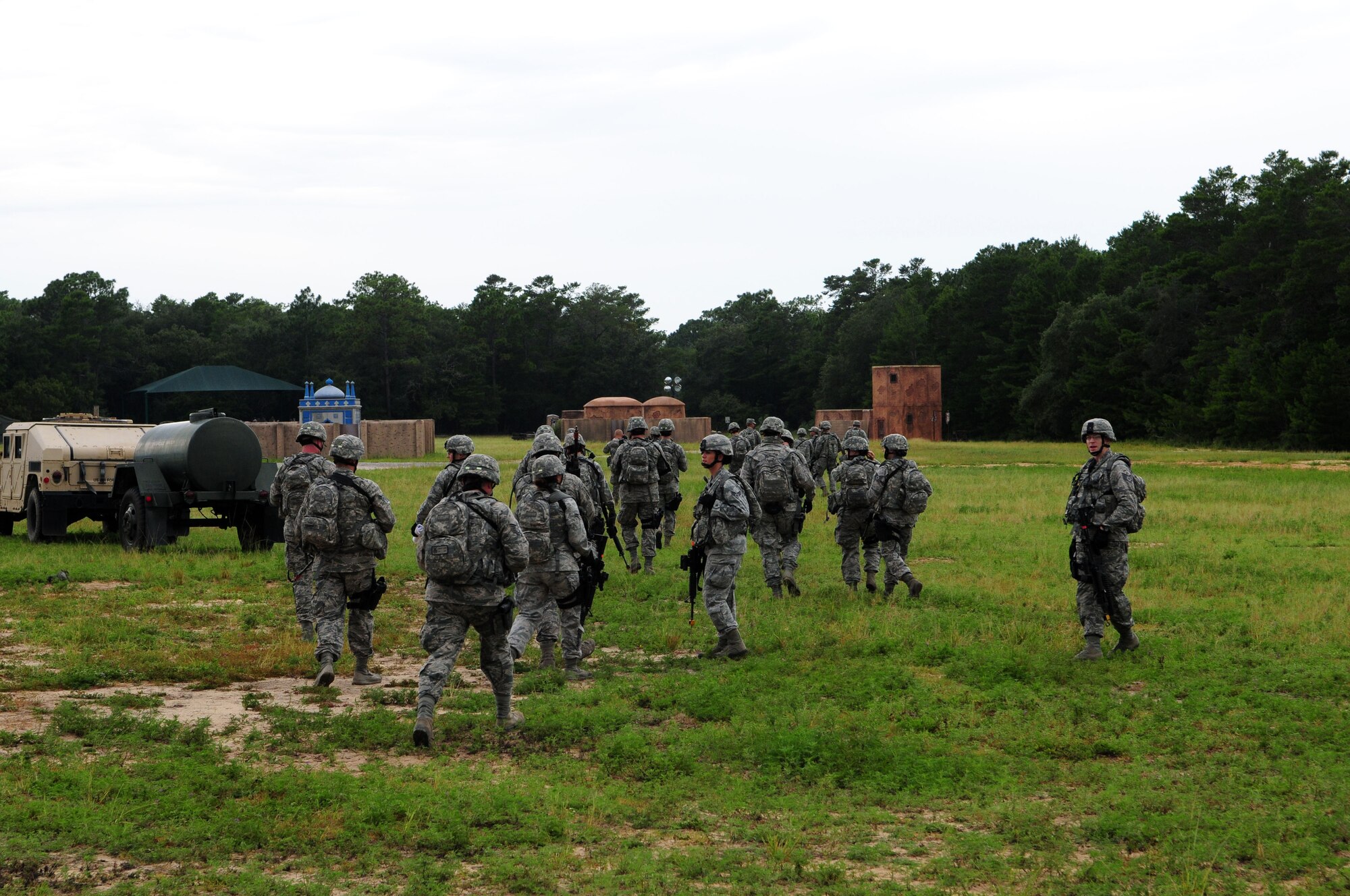 26 Security Forces Airmen from the 15th Fighter Wing, Madison, Wis., move toward final training at Eglin Air Force Base, Fla., Aug. 1313 and made final preparations for a six-month deployment to provide base defense at an undisclosed location in Southwest Asia.  The training is part of a 21-day program designed to give Airmen the latest in real world threats and prepare them for success while deployed.  (Air National Guard photo by Staff Sgt. Ryan Roth)