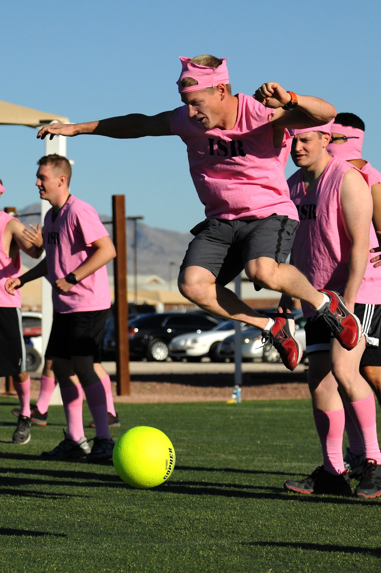 LAS VEGAS, Nev. -- An Airman with the 432nd Wing/432nd Air Expeditionary Wing dodges a ball during the wing’s Comprehensive Airmen Fitness Day dodge ball tournament, Aug. 9, 2013. The day’s event was to provide a fun and different approach to help strengthen Airmen’s understanding and application of CAF through interactive training and team-building activities. (U.S. Air Force photo by Staff Sgt. N.B./released)