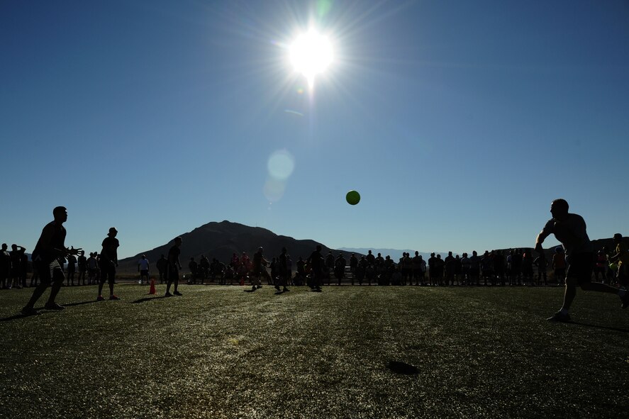 LAS VEGAS, Nev. -- Airmen from the 432nd Wing/432nd Air Expeditionary Wing participated in a kickoff dodge ball tournament as part of the Comprehensive Airmen Fitness Day, Aug. 9, 2013. The day’s event was to provide a fun and different approach to help strengthen Airman’s understanding and application of CAF through interactive training and team-building activities. (U.S. Air Force photo by Staff Sgt. N.B./released)