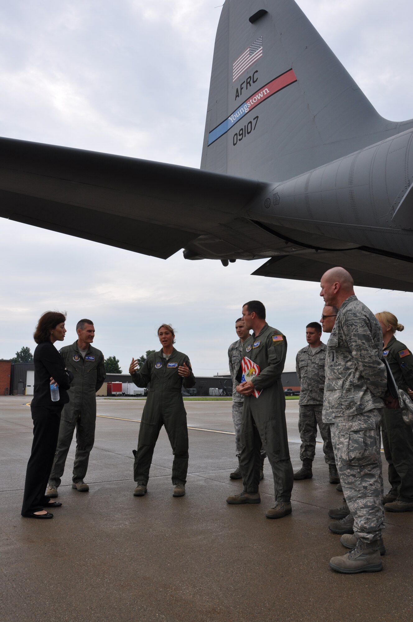 MANSFIELD-LAHM AIR NATIONAL GUARD BASE, Ohio – A group of Air Force Reserve Citizen Airmen from the 910th Airlift Wing, based at nearby Youngstown Air Reserve Station (YARS), Ohio talk with Dr. Janine Davidson (left), a member of the National Commission on the Structure of the Air Force, beneath the tail of one of the 910th’s C-130 Hercules cargo aircraft on the flightline here, July 30, 2013. Davidson is a presidential appointee on the commission and former deputy assistant secretary of Defense for Plans. A team of Citizen Airmen from YARS highlighted the capabilities the 910th and the air station during the meetings with the commission. The NCASF was formed to conduct a comprehensive study of the structure of the Air Force to determine whether, and how, the structure should be modified to best fulfill current and anticipated mission requirements for the Air Force consistent with available resources.