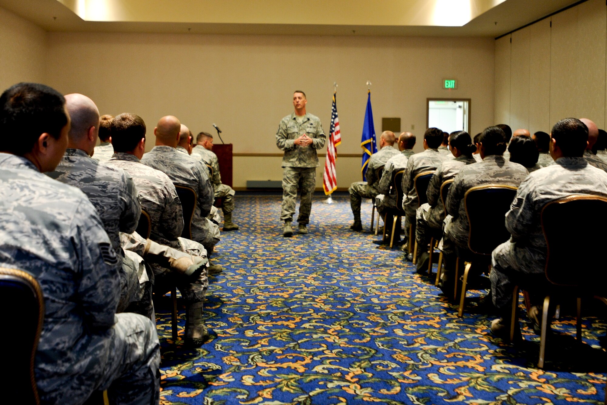 VANDENBERG AIR FORCE BASE, Calif. – Chief Master Sgt. Douglas McIntyre, Air Force Space Command command chief, speaks during a wing non-commissioned officer and senior NCO call here Wednesday, July 31, 2013. McIntyre spoke to Airmen about a variety of topics including special duty assignments, enlisted performance reports, and the physical fitness test standards. (U.S. Air Force photo/Airman Yvonne Morales)