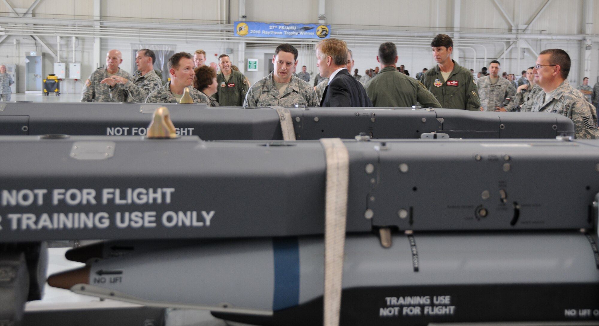Governor Bob McDonnell receives a brief on weapons and counter-measure capabilities of the F-22 Raptor from Master Sgt. Mark Gilligan, 192d Fighter Wing Maintenance Squadron, Virginia Air National Guard at Joint Base Langley-Eustis, August 13, 2013, during his "This Commonwealth of Opportunity" statewide tour. The F-22 is capable of carrying the Guided Bomb Unit 35 (GBU-35), Joint Direct Attack Munitions (JDAM), Air Intercept Munitions, (AIM 9 and 120) and 20 millimeter air-to-air munition rounds. Following his mission briefing on the F-22, the governor visited the 192d Intelligence Squadron and received a mission briefing on the Distributed Ground System capabilities.  (U.S. Air National Guard photo by Master Sgt. Carlos J. Claudio/Released).