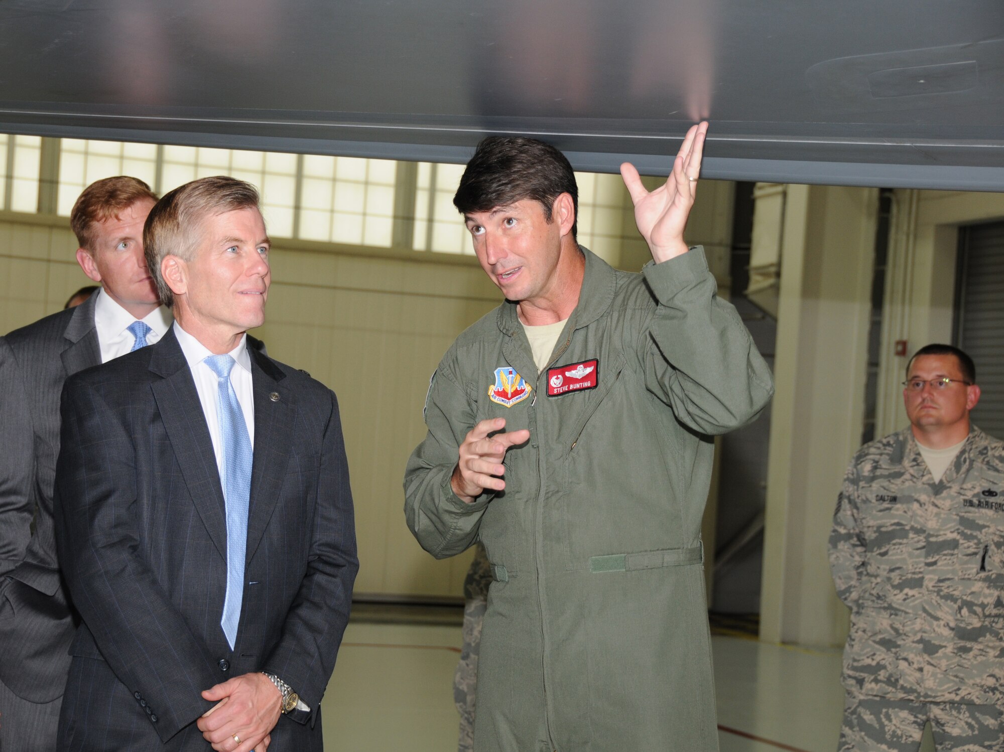 Governor Bob McDonnell receives a guided tour of the Air Force’s premier fighter jet, the F-22 Raptor from Lt. Col. Steve Bunting, 149th Fighter Squadron commander at Joint Base Langley-Eustis, August 13, 2013, during his "This Commonwealth of Opportunity" statewide tour. The 192nd Fighter Wing has flown the F-22 out of Langley Air Force Base since 2007. The Virginia Air National Guard has integrated and serves side by side with the 1st Fighter Wing in a Total Force Integration concept here.  (U.S. Air National Guard photo by Master Sgt. Carlos J. Claudio/Released).