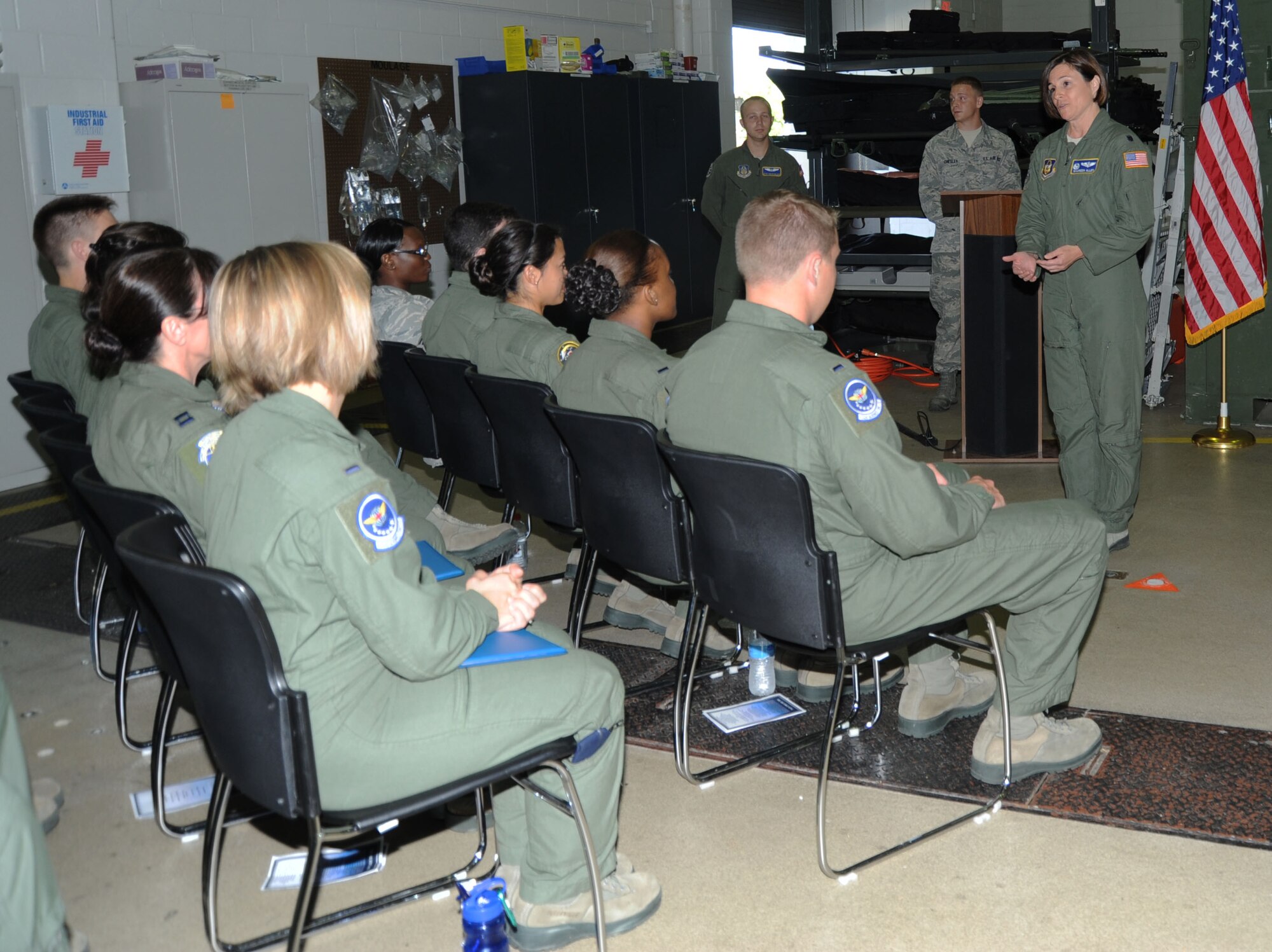 Lt. Col. Maureen Allen, commander of the Aeromedical Evacuation Formal Training Unit gives closing remarks at a graduation ceremony for fifteen AE FTU students here Aug. 12. AE FTU is a 28 day course and the final training students receive before becoming able to fly and perform medical tasks without an instructor. (U.S. Air Force photo by Senior Airman Melissa Dearstone)
