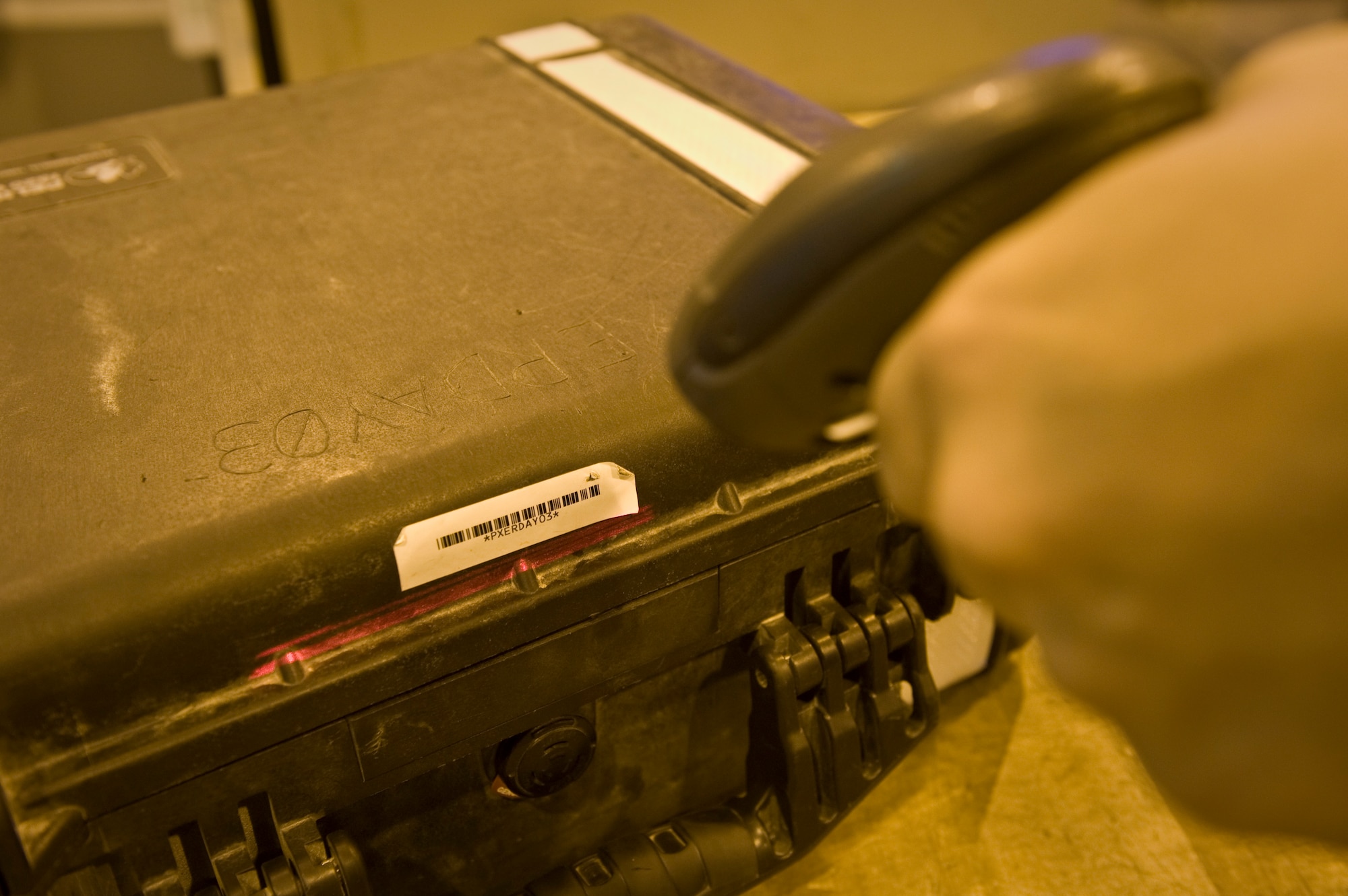 Senior Airman Tim Zuendel scans in a recently returned tool kit to the consolidated tool kit at the 379th Air Expeditionary Wing in Southwest Asia, Aug. 8, 2013. Zuendel is an 8th Expeditionary Air Mobility Squadron CTK custodian deployed from Travis Air Force Base, Calif., and hails from Maine, N.Y. (U.S. Air Force photo/Senior Airman Benjamin Stratton)