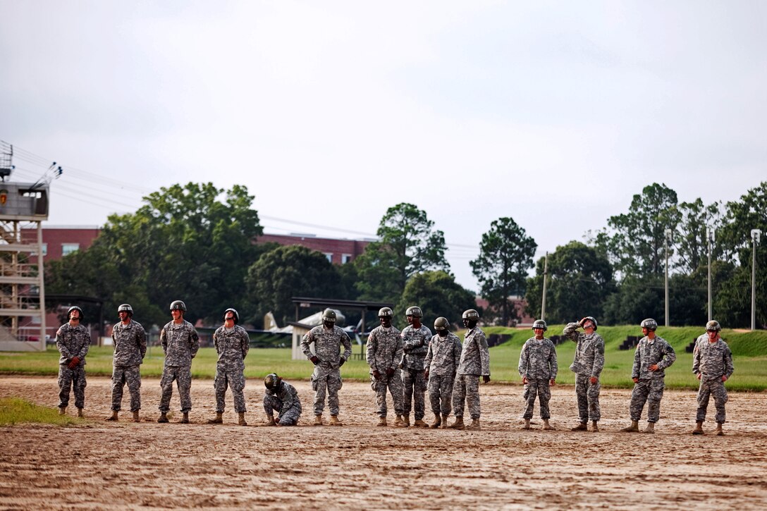 Soldiers wait for their turn to jump from the 250-foot tower at the U.S. Army Airborne School on Fort Benning, Ga., Aug. 7, 2013.