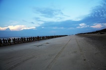 Marines with 2nd Maintenance Battalion, Combat Logistics Regiment 25, 2nd Marine Logistics Group went on a battalion run on Onslow Beach aboard Camp Lejeune, N.C., Aug. 14, 2013. The run brought the Marines back to their amphibious roots and gave them a break from the usual physical training session.  (U.S. Marine Corps photo by Lance Cpl. Shawn Valosin)