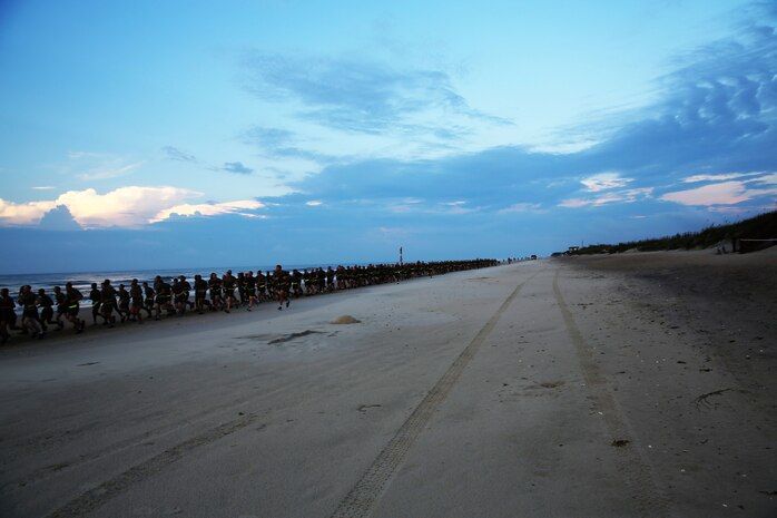 Marines with 2nd Maintenance Battalion, Combat Logistics Regiment 25, 2nd Marine Logistics Group went on a battalion run on Onslow Beach aboard Camp Lejeune, N.C., Aug. 14, 2013. The run brought the Marines back to their amphibious roots and gave them a break from the usual physical training session.  (U.S. Marine Corps photo by Lance Cpl. Shawn Valosin)