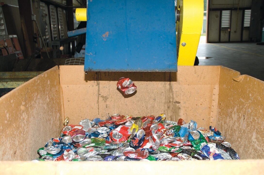 Aluminum cans pill up in a recycle bin inside the Base Recycling Center aboard Marine Corps Logistics Base Albany. 