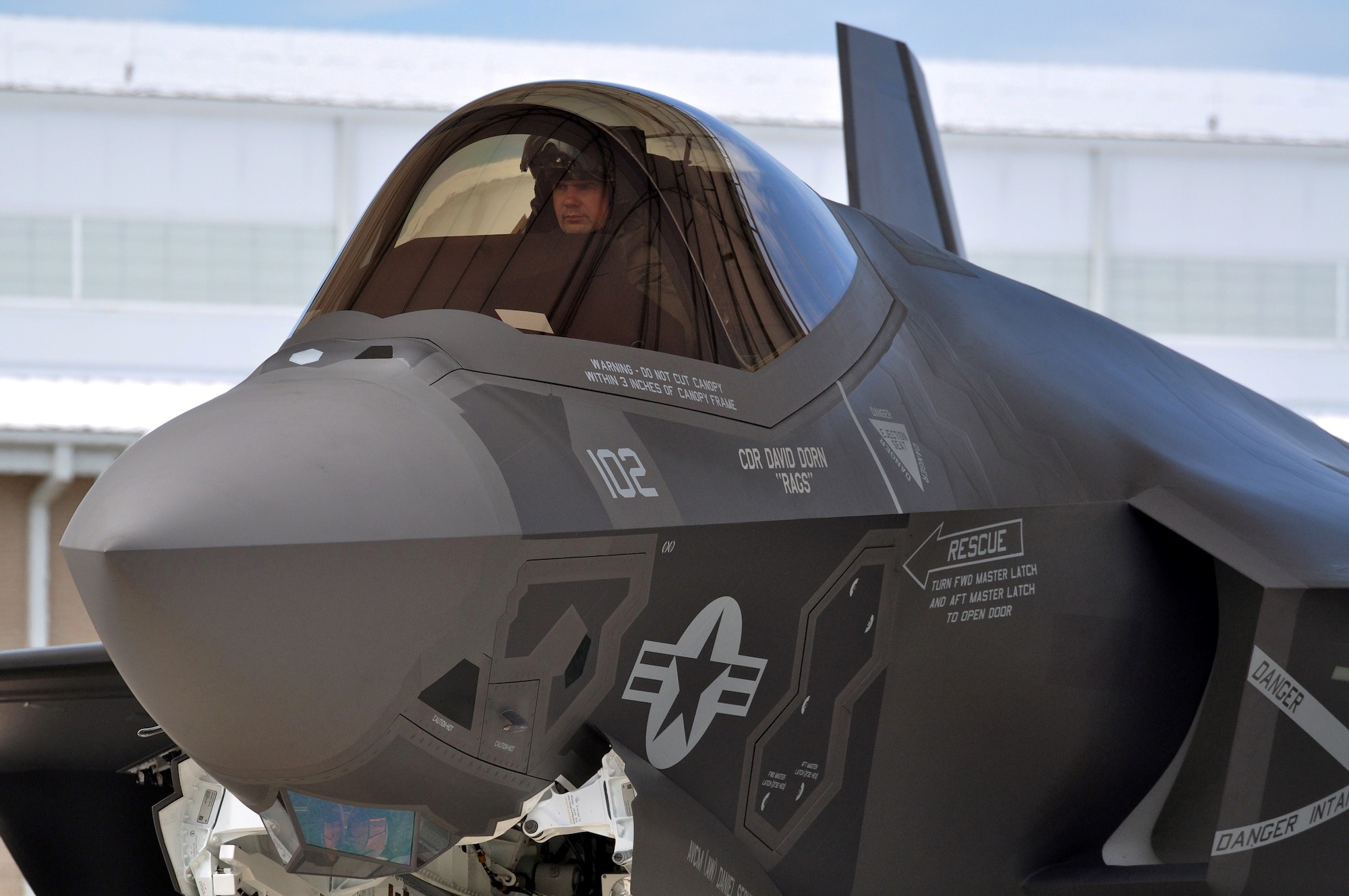 Navy Lt. Cmdr. Christopher Tabert returns from the first local flight of the carrier variant of the F-35C Lightning II, Joint Strike Fighter, Aug. 14, 2013, at Eglin Air Force Base's 33rd Fighter Wing. The unit, co-located at the wing, serves as the F-35C Fleet Replacement Squadron, training F-35C aircrew and maintenance personnel alongside Air Force, Marine and coalition partners in the joint strike fighter program. Tabert is an F-35 instructor pilot with the U.S. Navy Strike Fighter Squadron VFA-101.