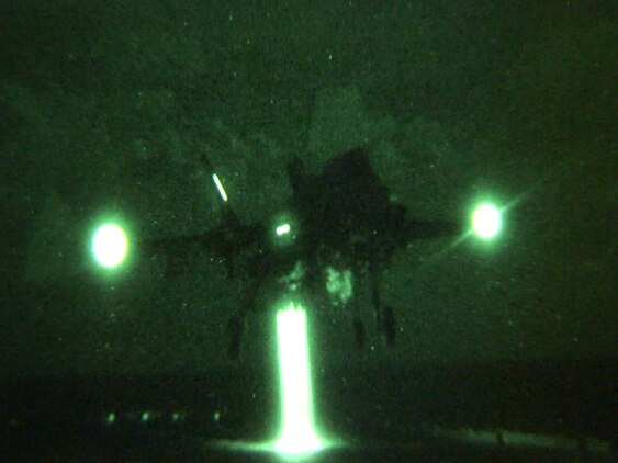Lt. Col. C.R. “Jimi” Clift makes the first F-35B Lightning II night landing on USS Wasp  during the second at-sea F-35 developmental test event, Aug. 14. The F-35 Integrated Test Force  is embarked on the Wasp for three weeks to expand the F-35B operational envelope in preparation for Marine Corps initial operational capability test in 2015. (Photo by MCSN Michael T. Forbes II, U.S. Navy)