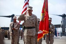 Col. Christopher C. Seymour salutes for the last time as the Marine Aircraft Group 26 commanding officer during a change of command ceremony at the Marine Medium Tiltrotor Training Squadron 204 flight line aboard Marine Corps Air Station New River, Aug. 2.