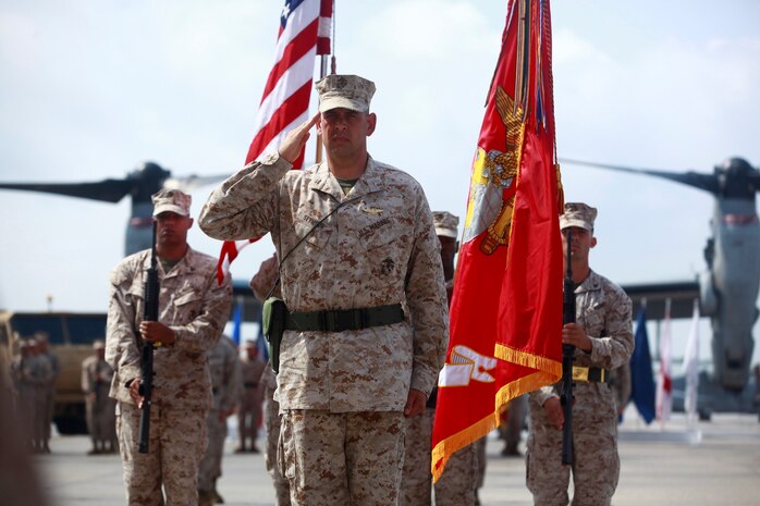 Col. Christopher C. Seymour salutes for the last time as the Marine Aircraft Group 26 commanding officer during a change of command ceremony at the Marine Medium Tiltrotor Training Squadron 204 flight line aboard Marine Corps Air Station New River, Aug. 2.