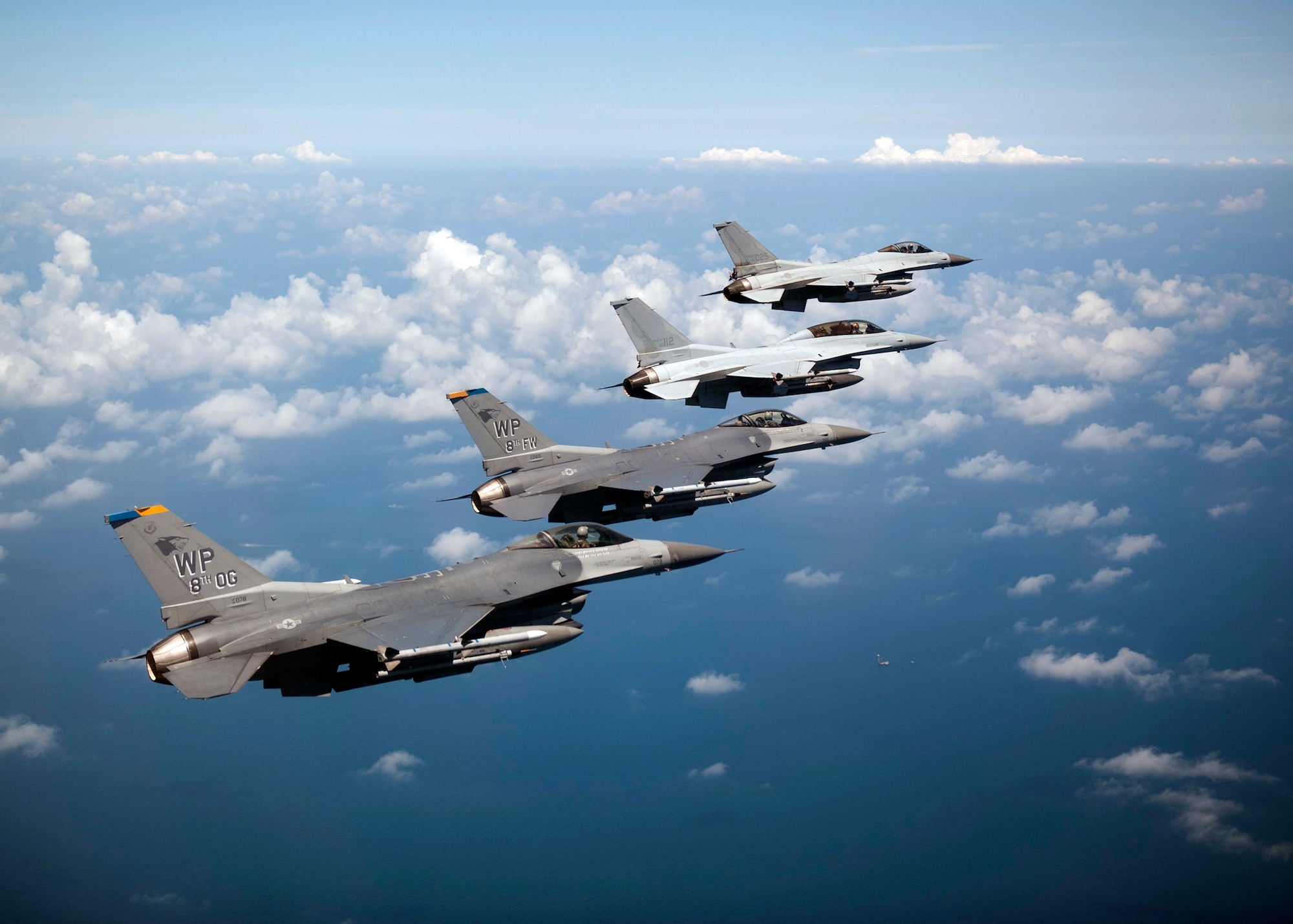 GUNSAN, Republic of Korea – Republic of Korea air force Colonel Min-Oh Seo, 38th Fighter Group commander, leads an F-16 friendship flight with Col. S. Clinton Hinote, 8th Fighter Wing commander, Aug. 14, 2013. The formation, which included leadership from the 8th FW and 38th FG, flew to several landmarks around Gunsan, ROK. (U.S. Air Force photo by Senior Airman Clayton Lenhardt/Released)