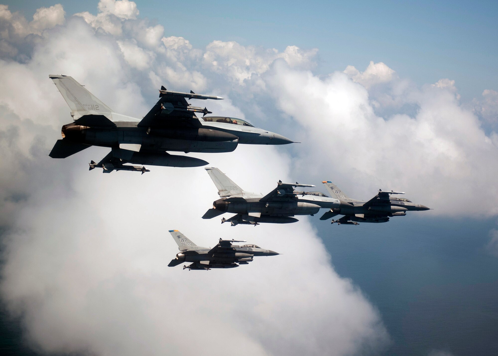 GUNSAN, Republic of Korea – Colonel S. Clinton Hinote, 8th Fighter Wing commander, leads a friendship flight with Republic of Korea air force Col. Min-Oh Seo, 38th Fighter Group commander, Aug. 14, 2013. The F-16 formation, which included leadership from the 8th FW and 38th FG, flew to several landmarks around Gunsan, ROK. (U.S. Air Force photo by Senior Airman Clayton Lenhardt/Released)