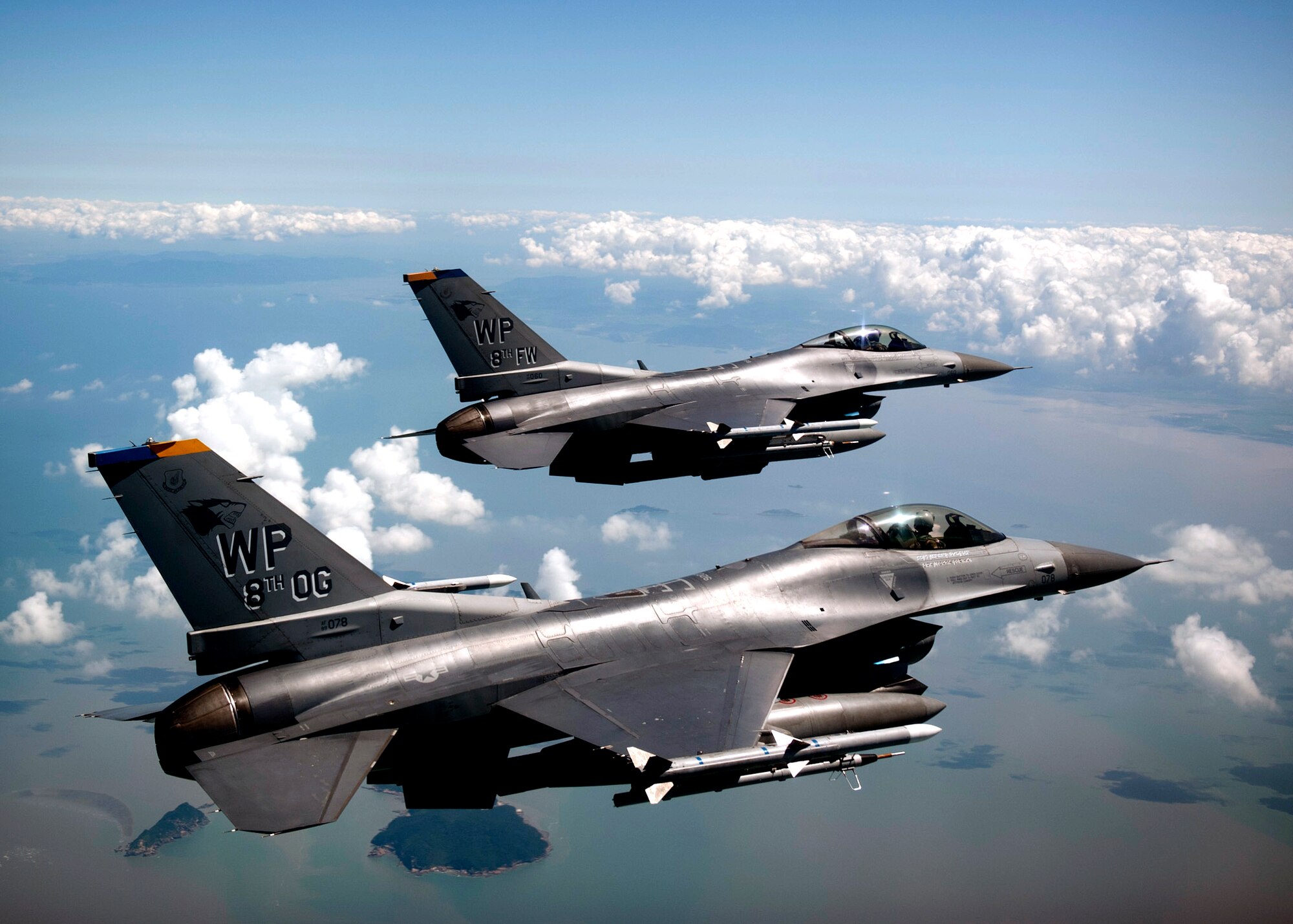 GUNSAN, Republic of Korea – Colonel S. Clinton Hinote, 8th Fighter Wing commander, and Lt. Col. Steve Tittel, 8th Operations Group deputy commander, take flight during a friendship flight, Aug. 14, 2013. Hinote, Tittel and Republic of Korea air force, 38th Fighter Group leadership flew in formation over Gunsan, ROK. (U.S. Air Force photo by Senior Airman Clayton Lenhardt/Released)