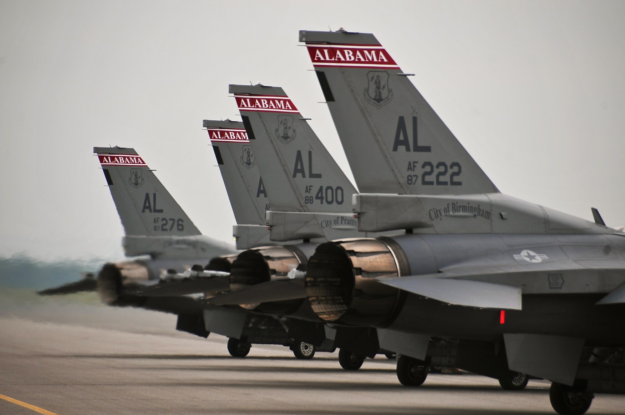 Four F-16 Fighting Falcons assigned to the 100th Fighter Squadron, Dannelly Field, Ala., line up for final inspection prior to take off during RED FLAG-Alaska 13-3 Aug. 12, 2013, Eielson Air Force Base, Alaska.  On an average, more than 1,000 people and up to 60 aircraft deploy to Eielson during the two-week exercise.(U.S. Air Force photo by Staff Sgt. Miguel Lara/Released)