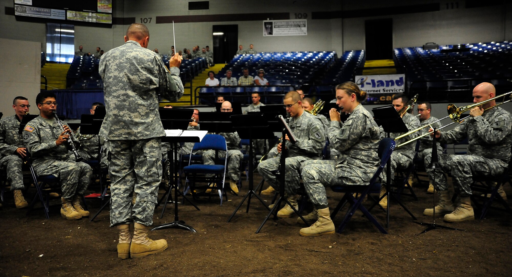 The Missouri National Guard’s 135th Army Band performs during the Military Appreciation Day ceremony, Aug. 11, 2013, at the Missouri State Fair in Sedalia, Mo. This year’s ceremony focused on highlighting the efforts of Guardsmen, who serve both their country and their communities. (U.S. Air Force photo by Staff Sgt. Brigitte N. Brantley/Released)