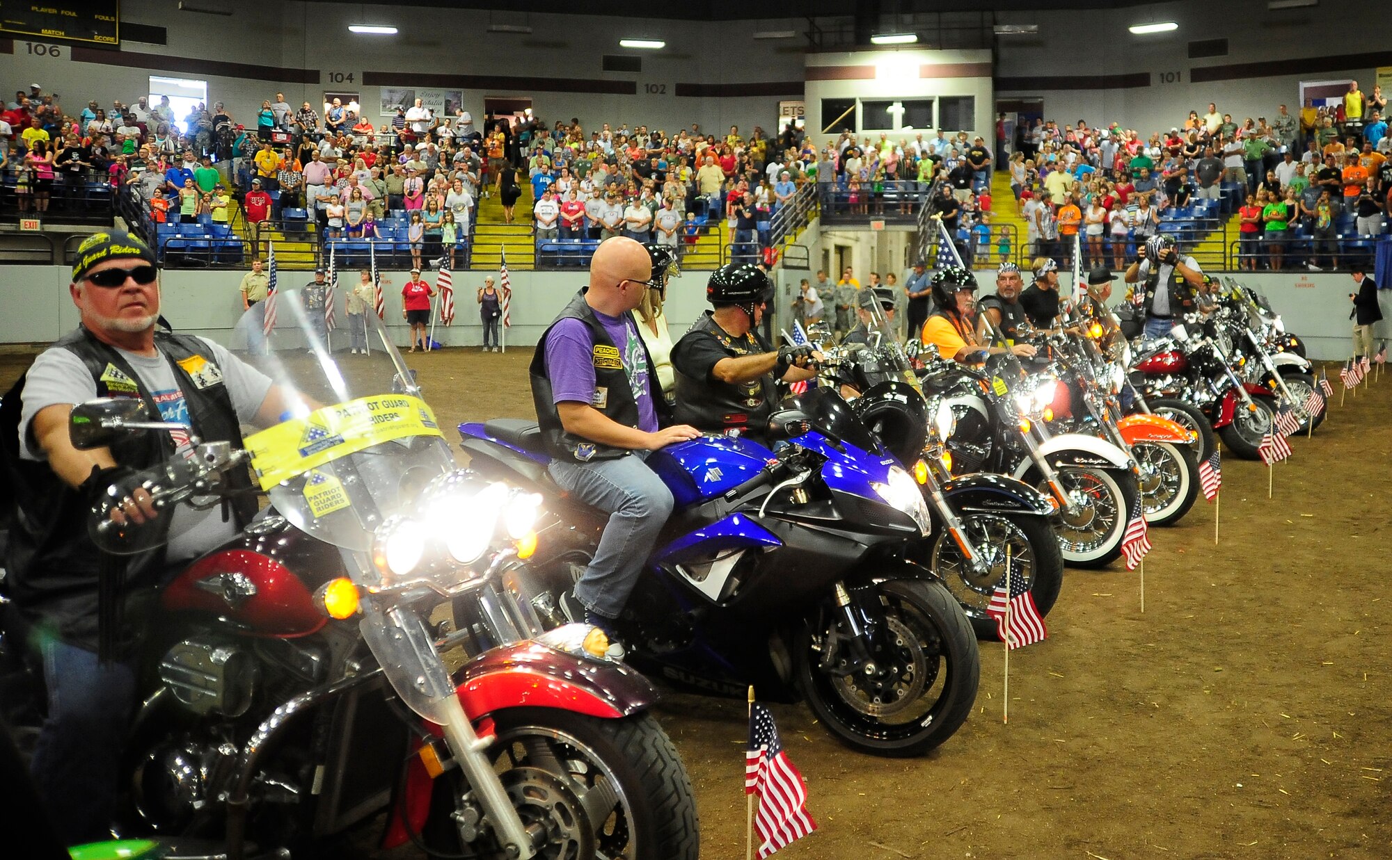 Members of the Missouri Patriot Guard Riders line up during the Military Appreciation Day ceremony, Aug. 11, 2013, at the Missouri State Fair in Sedalia, Mo. This year, the ceremony honored the Citizen Soldiers and Airmen of the U.S. National Guard who serve their country while also contributing to their communities. (U.S. Air Force photo by Staff Sgt. Brigitte N. Brantley/Released)