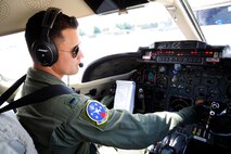 1st Lt. Kenneth Kaczmarek, 458th Airlift Squadron pilot, performs a preflight inspection on a C-21 before engine startup Aug. 15, 2013, Scott Air Force Base, Ill. The C-21 is a twin turbofan-engine aircraft capable of flying 530 mph and can reach an altitude of 45,000 feet. Scott AFB is the lead command for the aircraft. (U.S. Air Force photo/Staff Sgt. Christopher Boitz)
