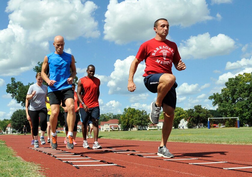 Airmen perform aerobic exercises featured in the Health and Wellness Center's Running Improvement Program on Barksdale Air Force Base, Aug. 12, 2013. The RIP is used as an intervention to help Airmen who have failed their physical training assessments, but is open to anyone desiring to improve their running speed, endurance or form. (U.S. Air Force photo/Airman 1st Class Benjamin Raughton) 
