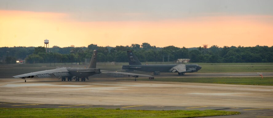 B-52H Stratofortress bombers taxi on the runway during a minimum interval takeoff on Barksdale Air Force Base, La., Aug. 15, 2013. This accelerated launch procedure allows aircraft to respond as rapidly as possible when called upon. In a conventional conflict, the B-52 can perform strategic attack, close-air support, air interdiction, offensive counter-air and maritime operations. (U.S. Air Force photo/Airman 1st Class Andrew Moua)