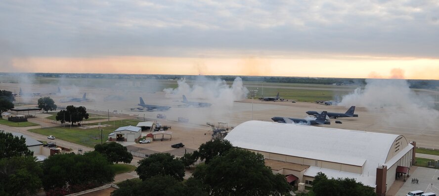 B-52H Stratofortress crews executed a minimum interval takeoff on Barksdale Air Force Base, Aug. 15, 2013. Starter cartridges, filled with gun powder, are used during this takeoff instead of the standard compressed air takeoff. The B-52 has served in every conflict since the Vietnam War. (U.S. Air Force photo/Senior Airman Sean Martin)