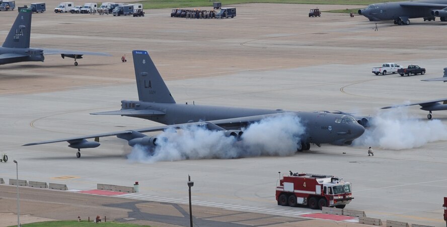 A B-52H Stratofortress is started up using starter cartridges on Barksdale Air Force Base, Aug. 15, 2013. This type of launch procedure allows our deterrent force to respond rapidly when called upon. The B-52 is classified as a long-range, heavy bomber and is capable of carrying 70,000 pounds of mixed ordnance. (U.S. Air Force photo/Senior Airman Sean Martin)