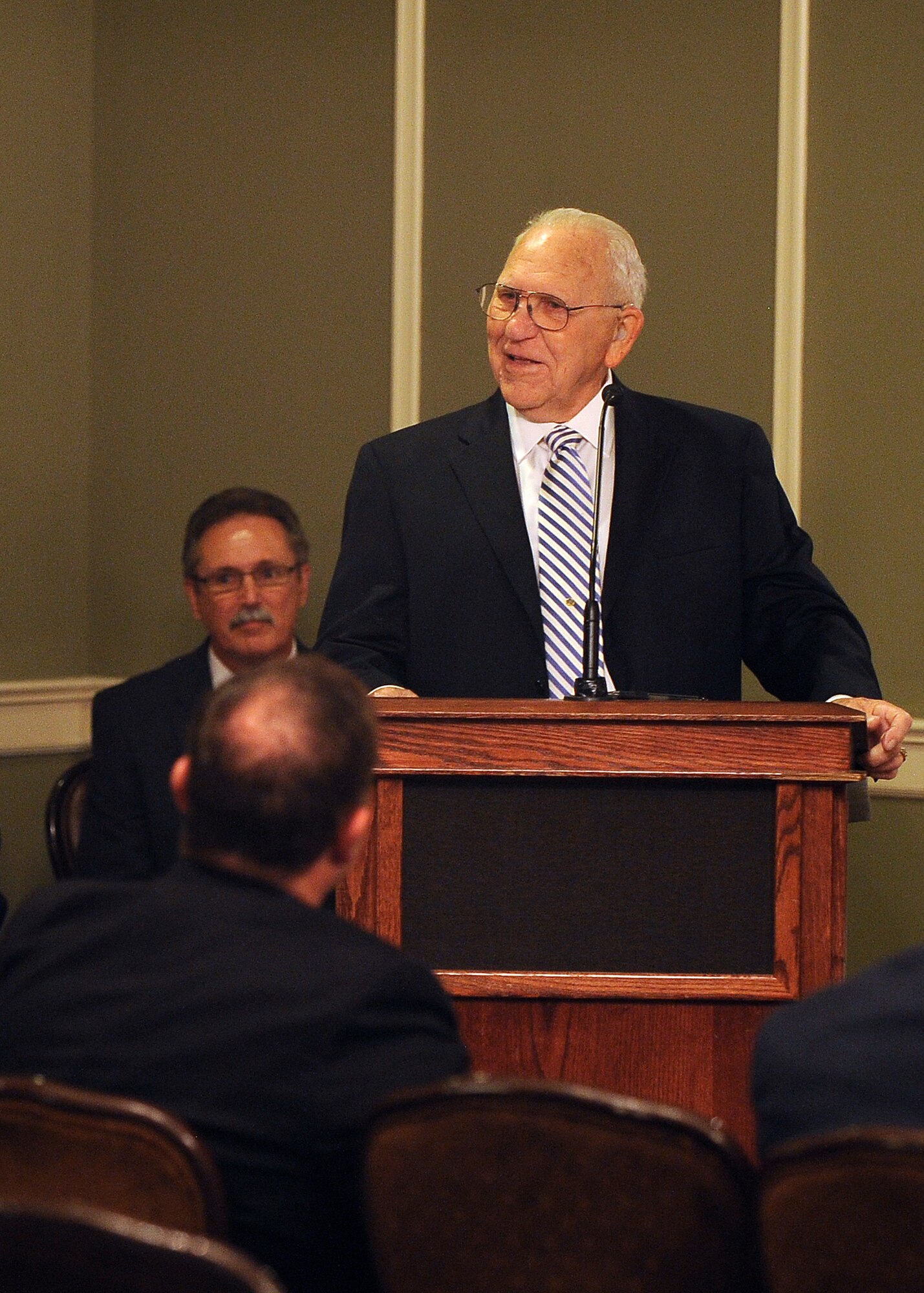 James Norwood, an electronic intelligence advisor with the National Security Agency’s representative office at United States Strategic Command, gives his farewell speech to a standing-room only crowd at his retirement ceremony held at the Patriot Club July 31 on Offutt Air Force Base, Neb.  Norwood’s nearly 60-year-long career consisted of 31 years as an enlisted airman and 29 years of civil service with the NSA.  (U.S. Air Force photo by Josh Plueger/Released)