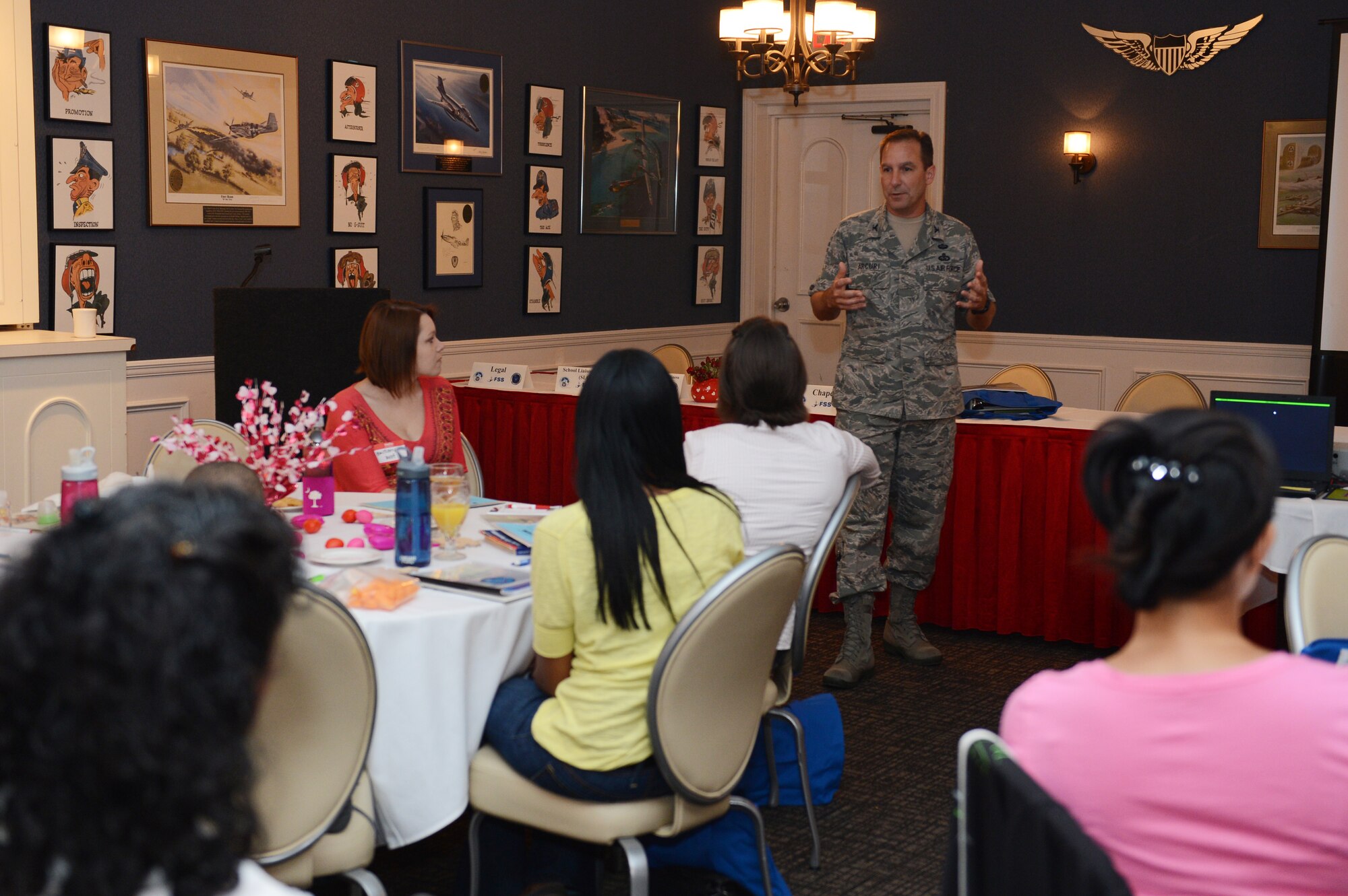 Col. Scott Arcuri, 20th Mission Support Group commander, speaks at an orientation for spouses, called Heart Link, at the Carolina Skies Club and Conference Center at Shaw Air Force Base, S.C., Aug. 13, 2013. The purpose of the event was to introduce spouses to military life and connect them with base resources and other spouses. (U.S. Air Force photo by Airman 1st Class Krystal M. Jeffers/Released)