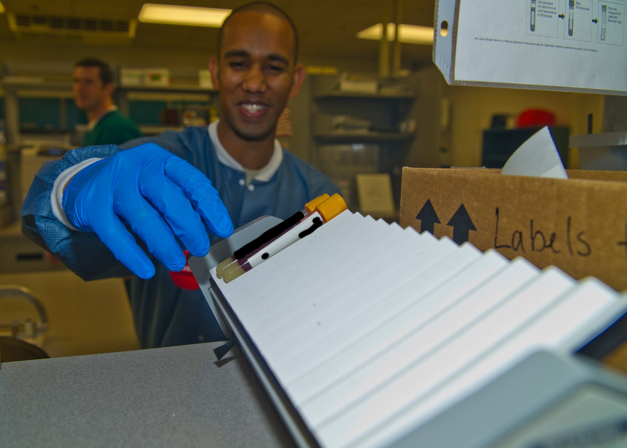 Staff Sgt. Renaldo Maroney, 49th Medical Group medical laboratory technician, collects blood samples for testing at Holloman Air Force Base, N.M., Aug. 14. The 49th MDG has 13 sections that work directly with patients and serves over 14,000 beneficiaries. The group employs 222 active-duty and civilian personnel with various jobs supporting the medical needs of Team Holloman. (U.S Air Force photo by Airman 1st Class Leah Murray/Released)