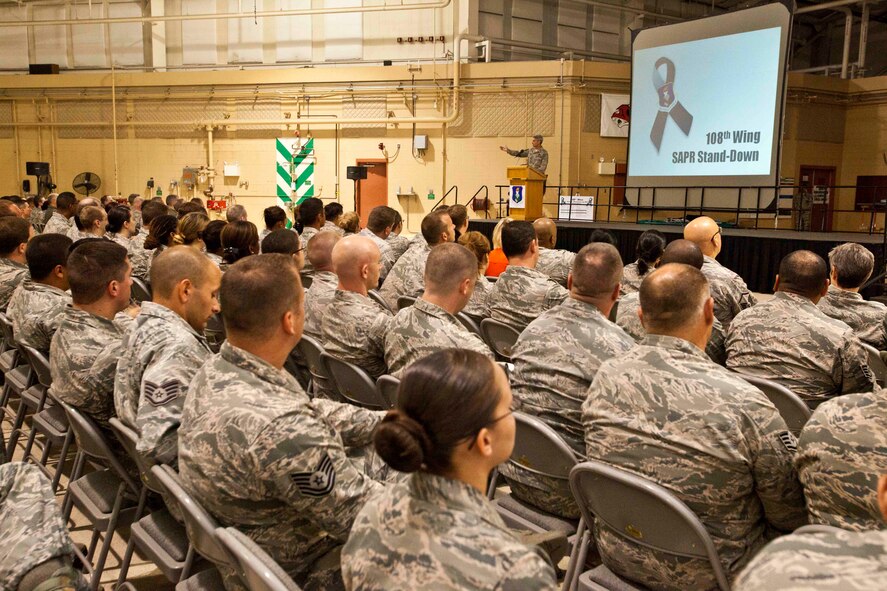 Col. Kevin J. Keehn, , 108th Wing commander, N, speaks to Wing members during the sexual assault prevention and response stand down Aug. 11, 2013, at Joint Base McGuire-Dix-Lakehurst, N.J. The purpose of the SAPR stand down is to foster a climate of accountability while reinforcing the Department of Defense's position that sexist behavior, sexual harassment, and sexual assault will not be tolerated, condoned or ignored. Airmen at all levels, both military and civilian, will be held accountable for their conduct and behavior; and victims of these criminal acts will be treated with dignity and respect, as well as provided the best medical and rehabilitative care available. (U.S. Air Force photo by Master Sgt. Mark C. Olsen/Released)