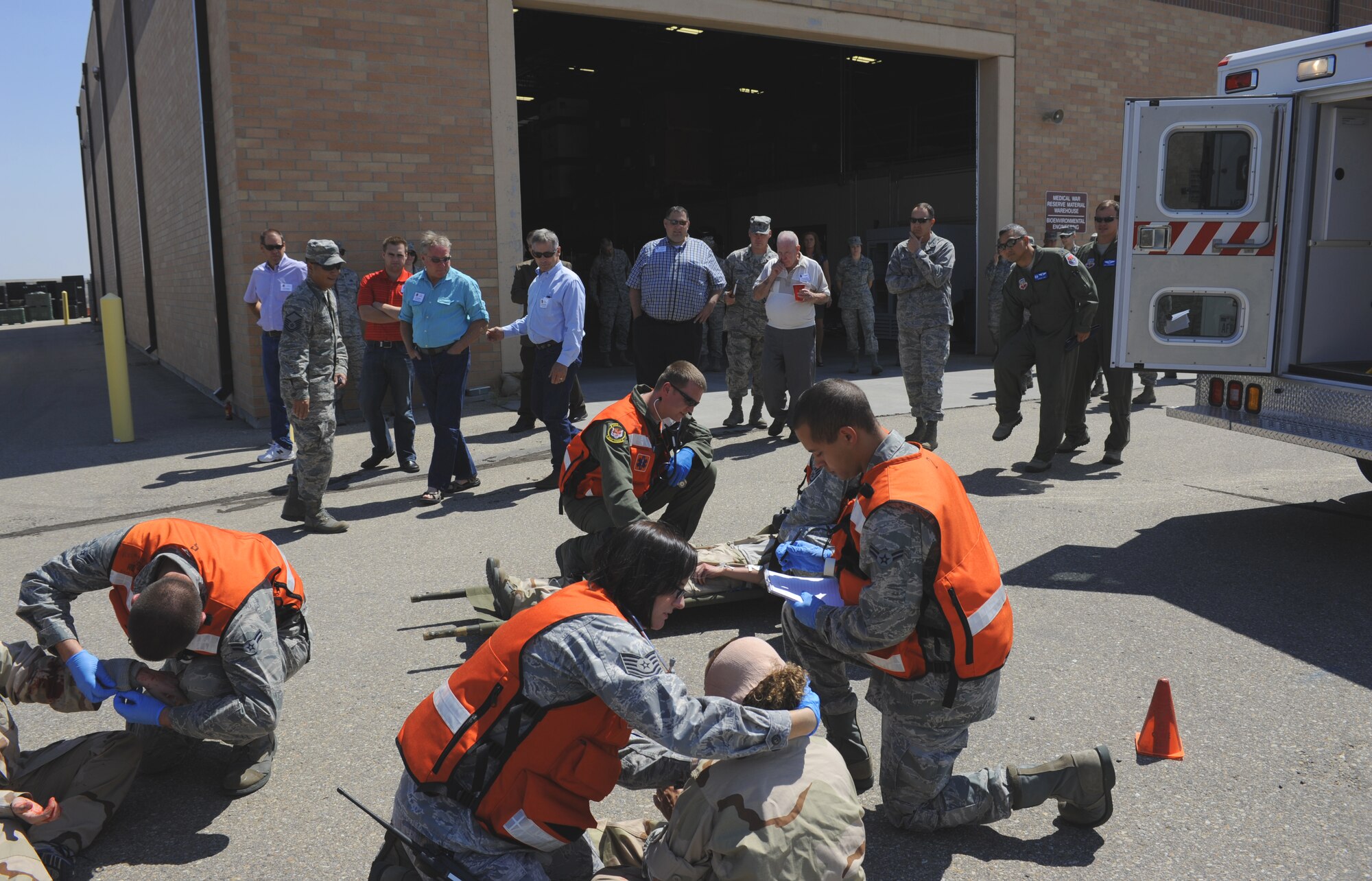 366th Medical Group personnel respond during an exercise Aug. 14, 2013, at Mountain Home Air Force Base, Idaho. First responders demonstrated how to deal with extreme situations for local civic leaders during a 366th MDG honorary commander's day. (U.S. Air Force photo by Senior Airman Benjamin Sutton/Released)