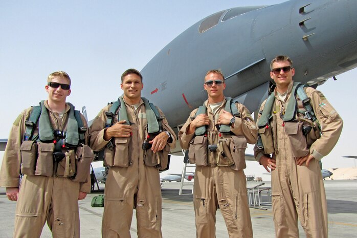 1st Lt. Anthony Rocco, Capt. Jeremy Stover, Capt. Dustin and 1st Lt. Travis Keene pose for a group photo in front of a B-1B Lancer in Afghanistan. The aircrew was named the Air Force’s 2012 Bomber Crew of the Year and was awarded with the Air Force Association’s Gen. Curtis E. LeMay Award. (Courtesy photo) 