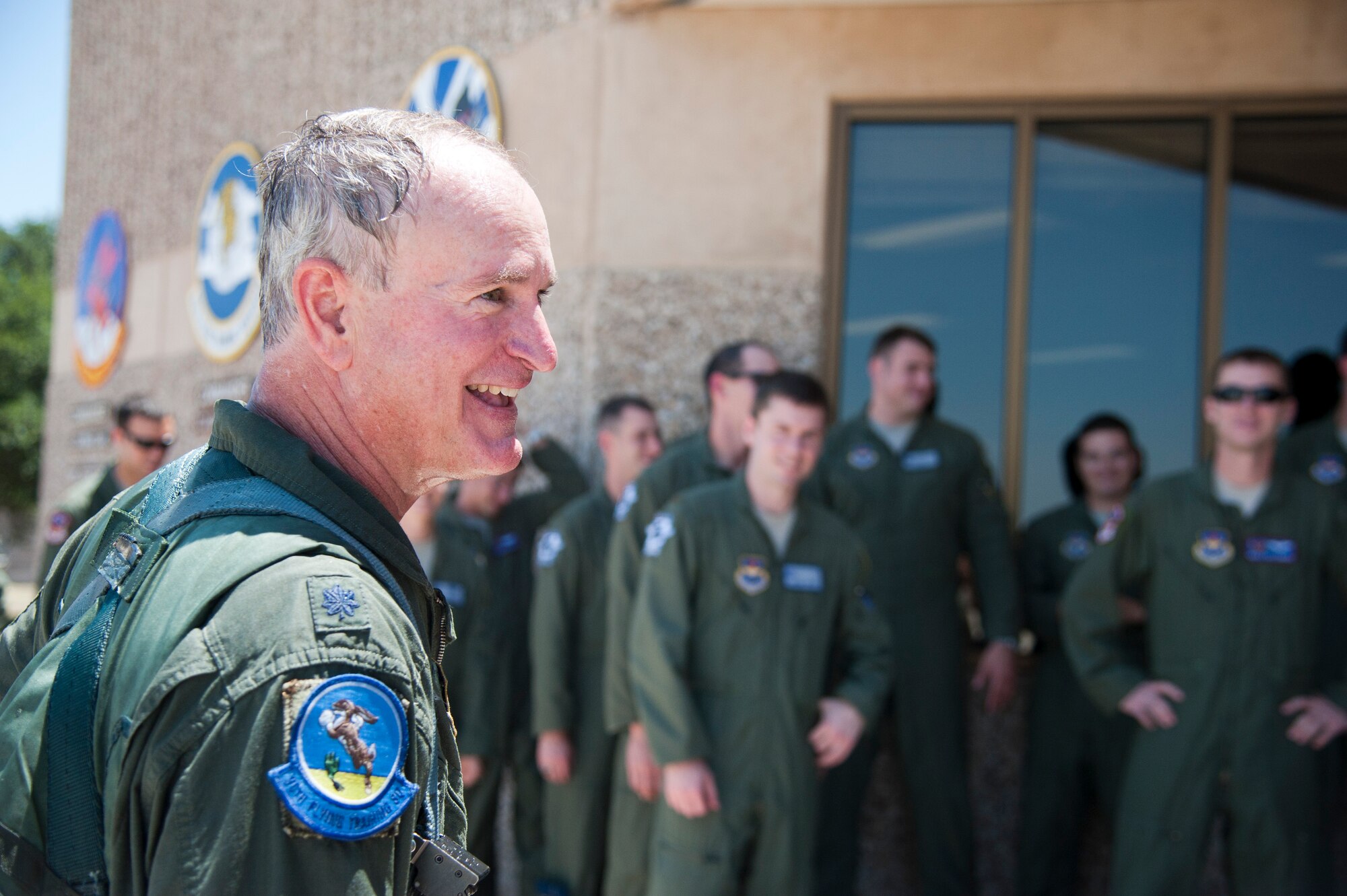 Fellow pilots greet Lt. Col. Timothy Webster, 96th Flying Training Squadron instructor pilot, upon his return from a flight in which he reached the milestone of flying 3,000 hours in the T-38 Talon at Laughlin Air Force Base, Texas, July 31, 2013. Most of his flight hours were flown at Laughlin as an instructor pilot. (U.S. Air Force photo/Airman 1st Class Jimmie D. Pike)