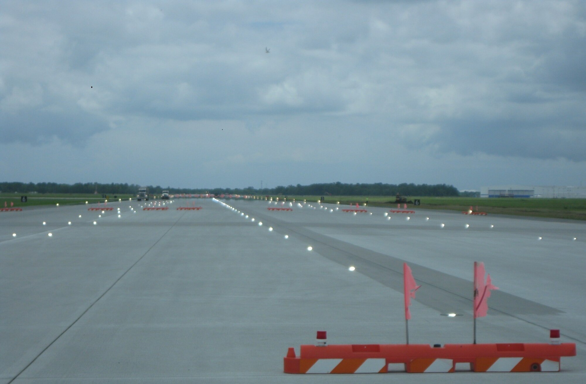JOINT BASE CHARLESTON, S.C. -- AFCEC executed a $40 million contract to replace a runway here. The runway, which re-open Aug. 16, 2013, features a new
aircraft arresting system and improved infrastructure for navigational aids. Outdated lighting was also replaced with high-efficiency, longer-lasting LED lights. (U.S. Air Force photo/Mark Dent)