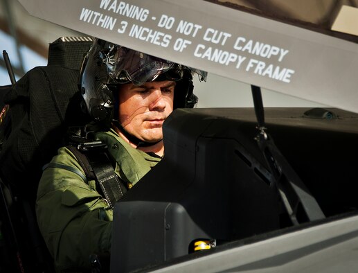 Lt. Cdr. Chris Tabert pilots the first F-35C Lightning II flight at Eglin Air Force Base Aug. 14. Before arriving to U.S. Navy F-35 Strike Fighter Squadron VFA 101 in February, he served as a test pilot for the joint strike fighter program at Naval Air Station Patuxent River. He will become the squadron's first instructor pilot and join a collocated team of Marine, Navy, Air Force and international partners training here.  (U.S. Air Force photo/Samuel King Jr.) 
