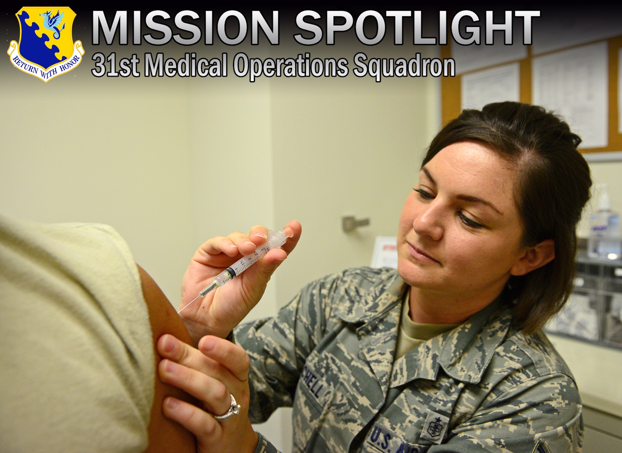 Staff Sgt. Amanda Mitchell, 31st Medical Operations Squadron allergy and immunizations technician, vaccinates a patient, Aug. 14, 2013, at Aviano Air Base, Italy. The immunization clinic also specializes in allergy shots and skin testing. (U.S. Air Force photo/Airman 1st Class Matthew Lotz)