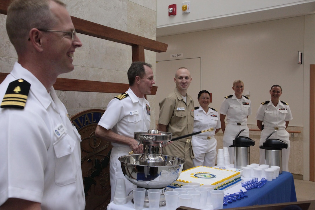 Members of the Medical Service Corps celebrate the 66th birthday of their organization Aug. 5 at U.S. Naval Hospital Okinawa. The Army-Navy Medical Service Act came into effect Aug. 4, 1947, and with it the Medical Service Corps, providing a permanent group of specialized commissioned officers ready to support the field of military medicine. “Thirty one specialties in the areas of science, allied health and administrationmake up the Medical Service Corps,” according to Navy Capt. Anne M. Swap, the commanding officer of USNH Okinawa. “Medical Service Corps (personnel) serve at sea, on deployments and humanitarian missions, as well as in clinics, inpatient facilities and research units around the world.” 