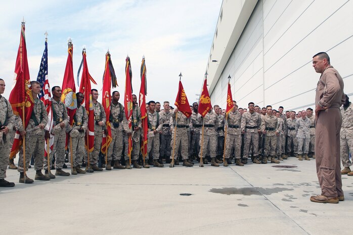 Col. Christopher C. Seymour, former commander of Marine Aircraft Group 26, thanks the Marines of his command for their hard work and dedication after his last flight, July 31. Seymour began his service as MAG-26 commander in May 2011 and is stepping down Friday, Aug. 2.