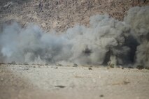 Explosions made by the engineers of Marine Wing Support Squadron 272 during a demolition range at Camp Wilson aboard Marine Corps Air-Ground Combat Center Twentynine Palms, Calif., August 6.