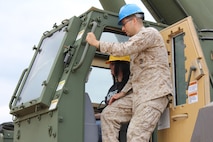 Military Spouses operating heavy equipment.