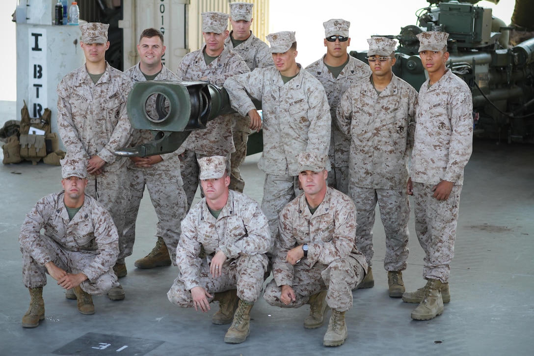 A gun grew serving with India Battery, 1st Battalion, 11th Marine Regiment, provided preventative maintenance to an M777 Lightweight Howitzer at the 11th Marines gun park here, Aug. 14, 2013. The field artillery Marines prepped the howitzer for the upcoming regimental fire exercise Aug. 19 through 28.